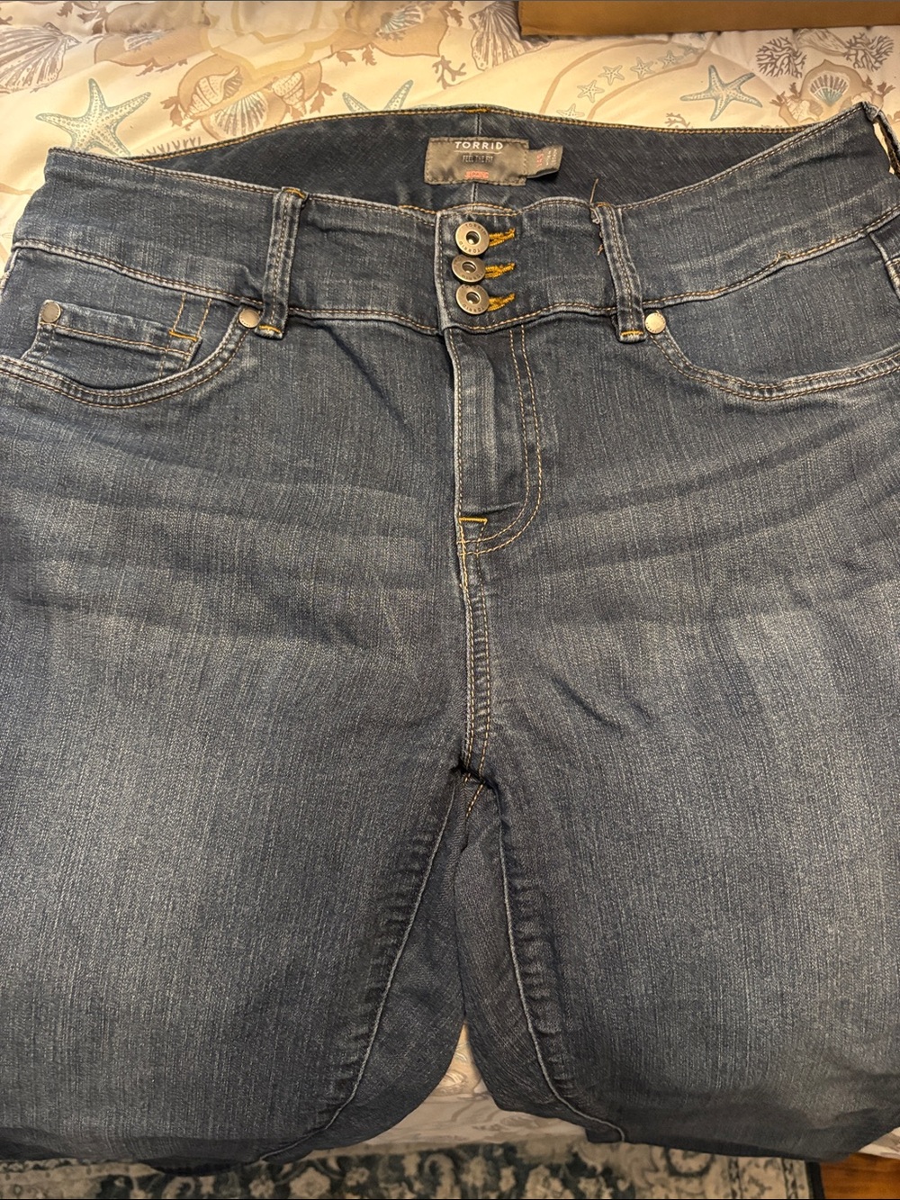 torrid dark blue high-rise jeans with triple-button waist